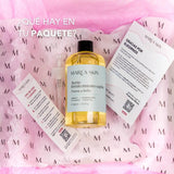 Aceite de fortalecimiento capilar en su caja y con los complementos que incluye la compra